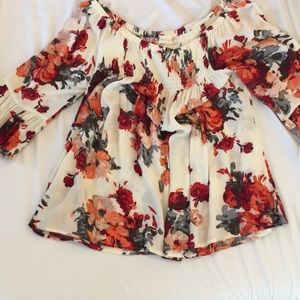 Floral off the shoulder Altar’d State shirt.